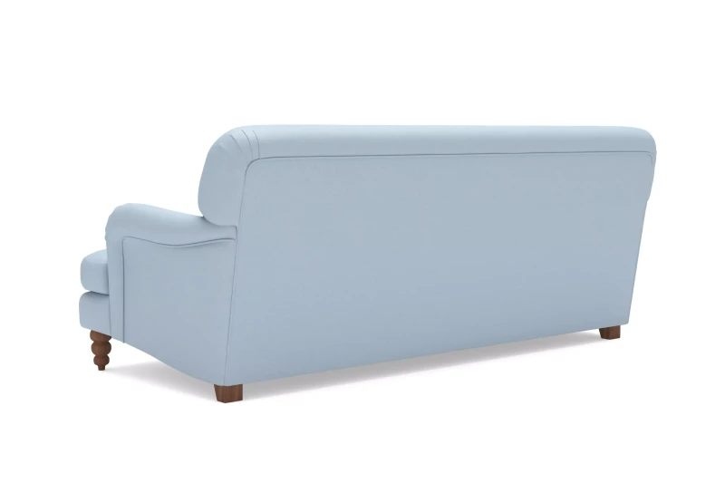 Sofa tapicerowana Amanda – klasyczna forma z zaokrąglonymi podłokietnikami i subtelnymi przeszyciami.